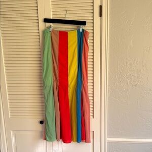 Amazing skirt with front panels cut for movement and flair.  Lined